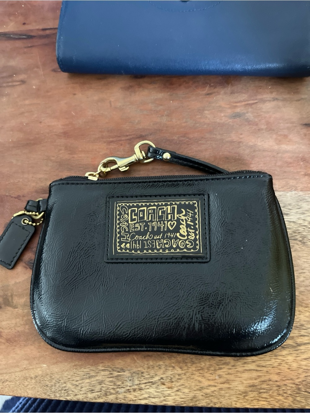 Coach Black Patent Leather Wristlet with Gold Logo Patch